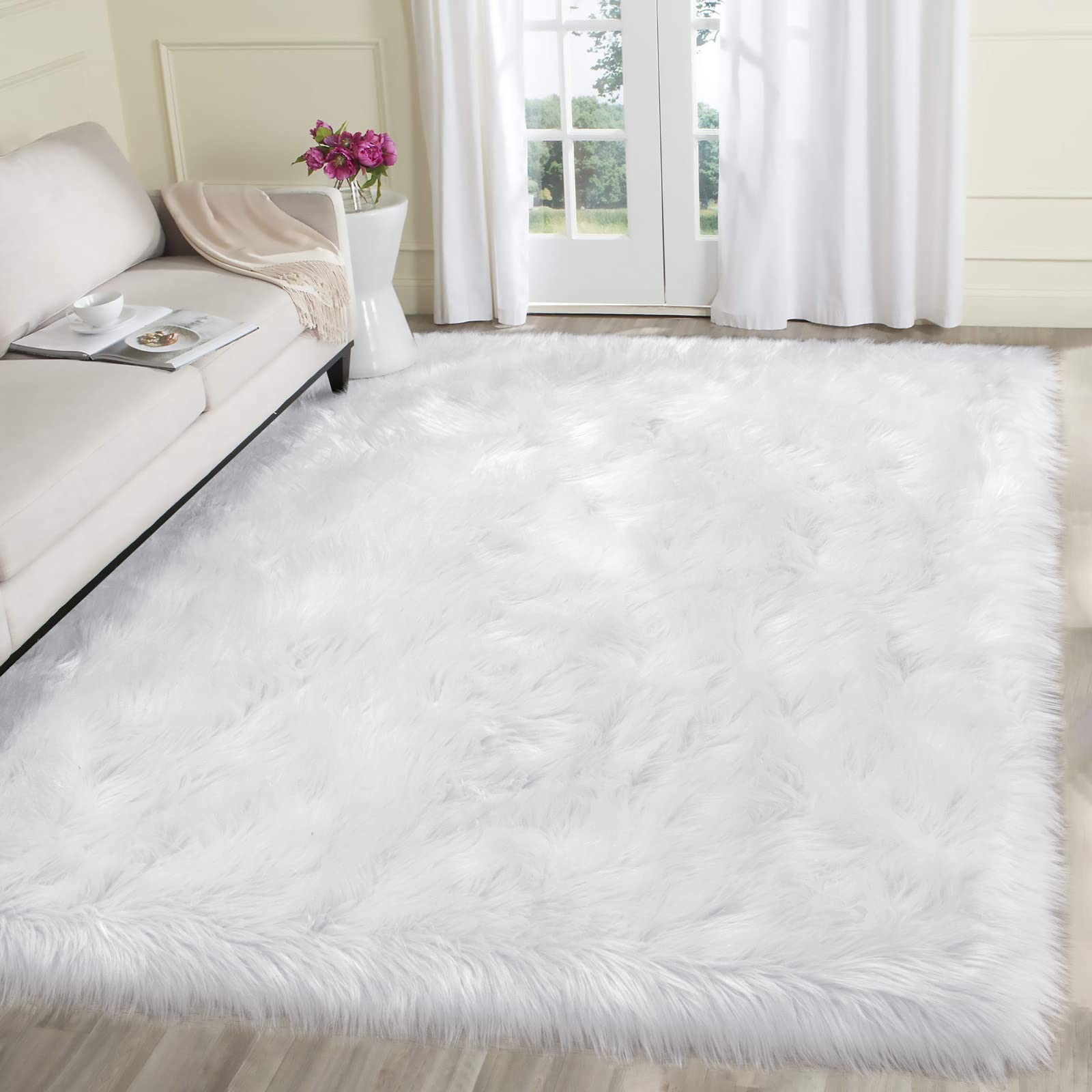 SERISSA Soft Fluffy Area Rug, Coal Black Faux Sheepskin Fur Rug, Shaggy Rug for Bedroom Floor Fuzzy Carpet for Living Room 4x6 Feet