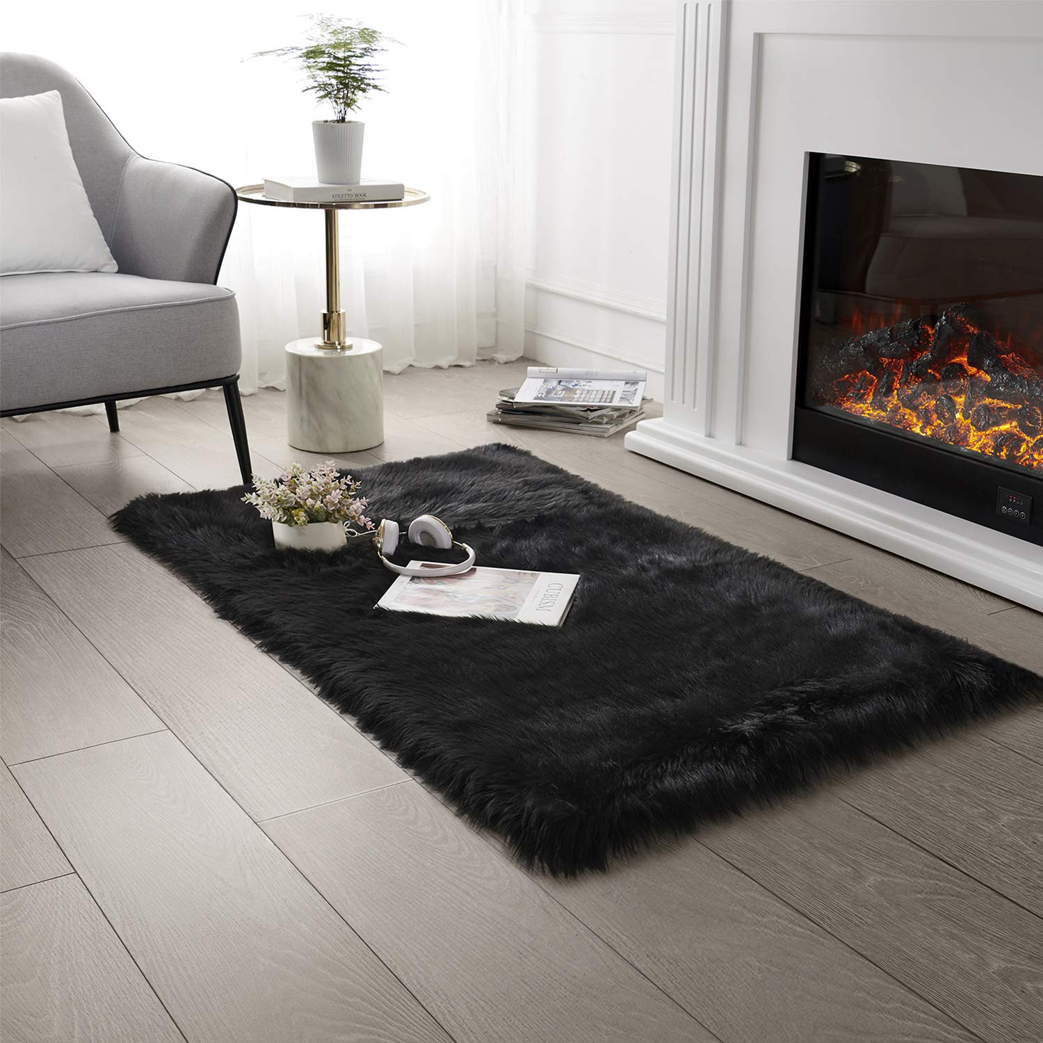 SERISSA Soft Fluffy Area Rug, Coal Black Faux Sheepskin Fur Rug, Shaggy Rug for Bedroom Floor Fuzzy Carpet for Living Room 4x6 Feet
