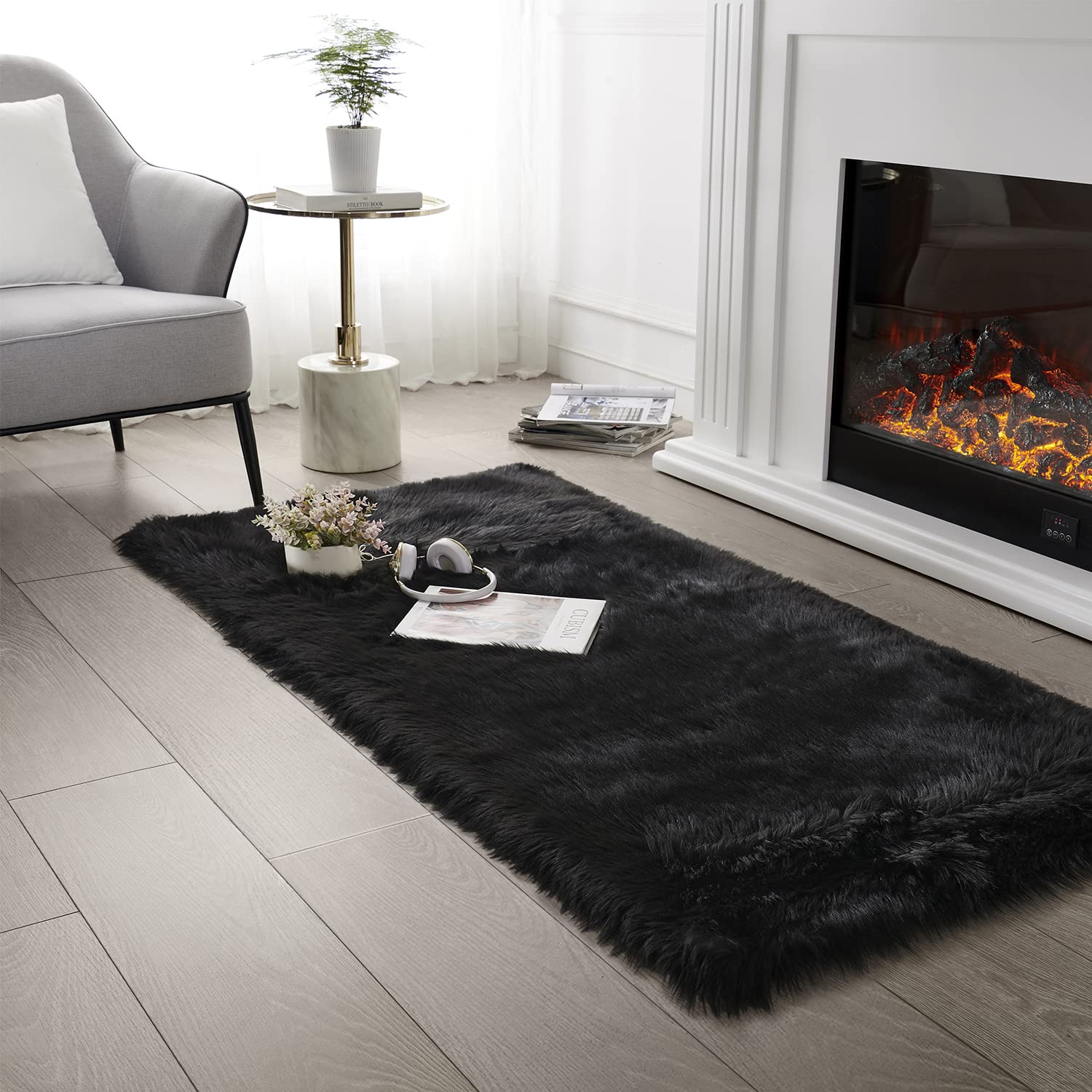 SERISSA Soft Fluffy Area Rug, Coal Black Faux Sheepskin Fur Rug, Shaggy Rug for Bedroom Floor Fuzzy Carpet for Living Room 4x6 Feet