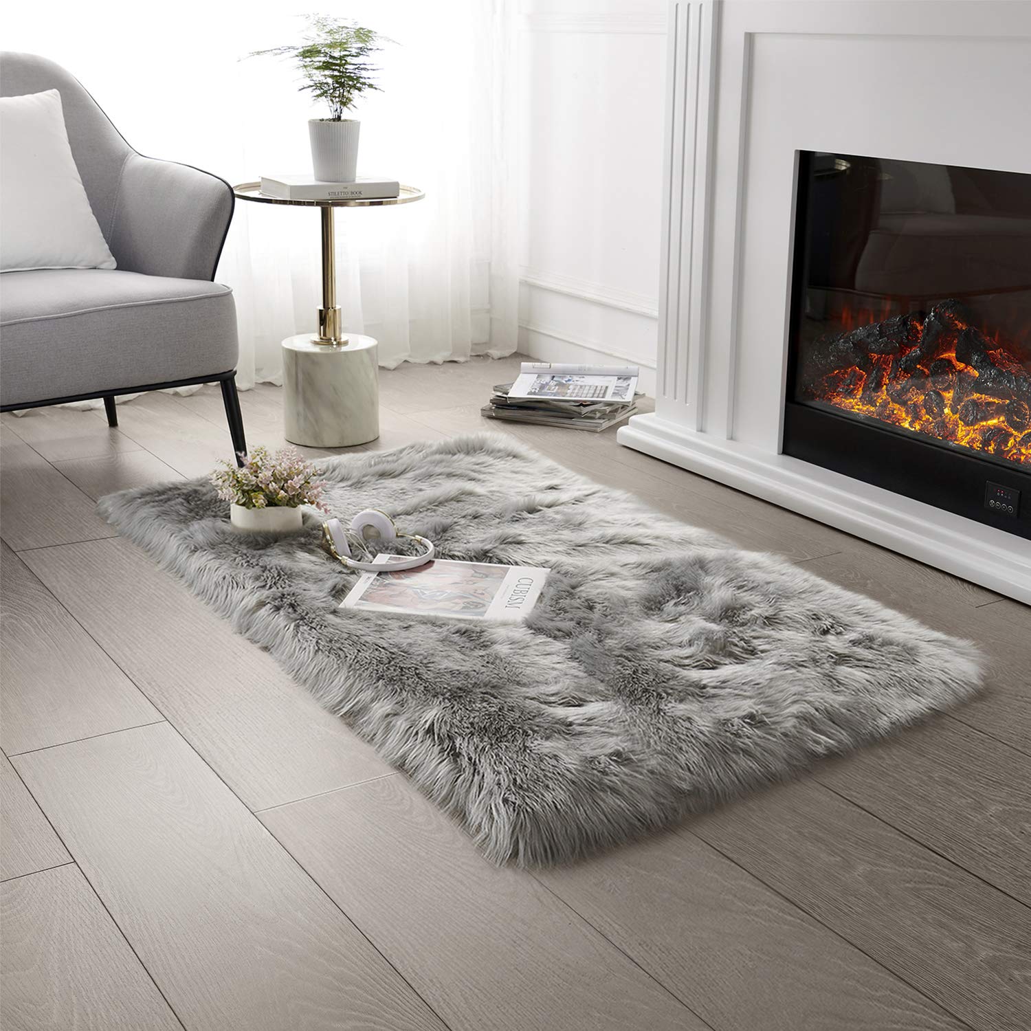 SERISSA Soft Fluffy Area Rug, Coal Black Faux Sheepskin Fur Rug, Shaggy Rug for Bedroom Floor Fuzzy Carpet for Living Room 4x6 Feet