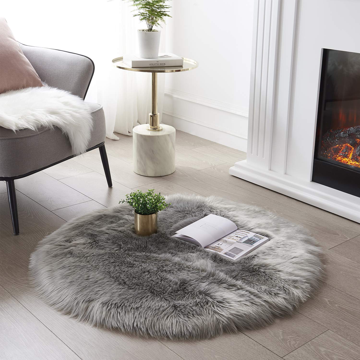 SERISSA Soft Fluffy Area Rug, Coal Black Faux Sheepskin Fur Rug, Shaggy Rug for Bedroom Floor Fuzzy Carpet for Living Room 4x6 Feet