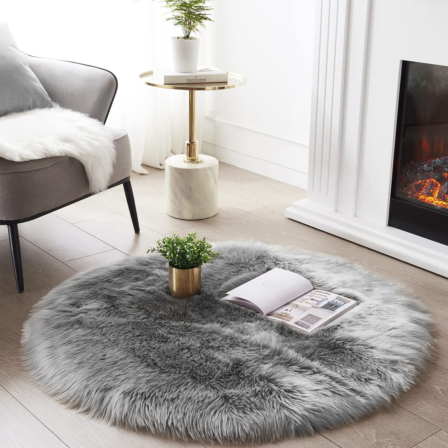 SERISSA Soft Fluffy Area Rug, Coal Black Faux Sheepskin Fur Rug, Shaggy Rug for Bedroom Floor Fuzzy Carpet for Living Room 4x6 Feet